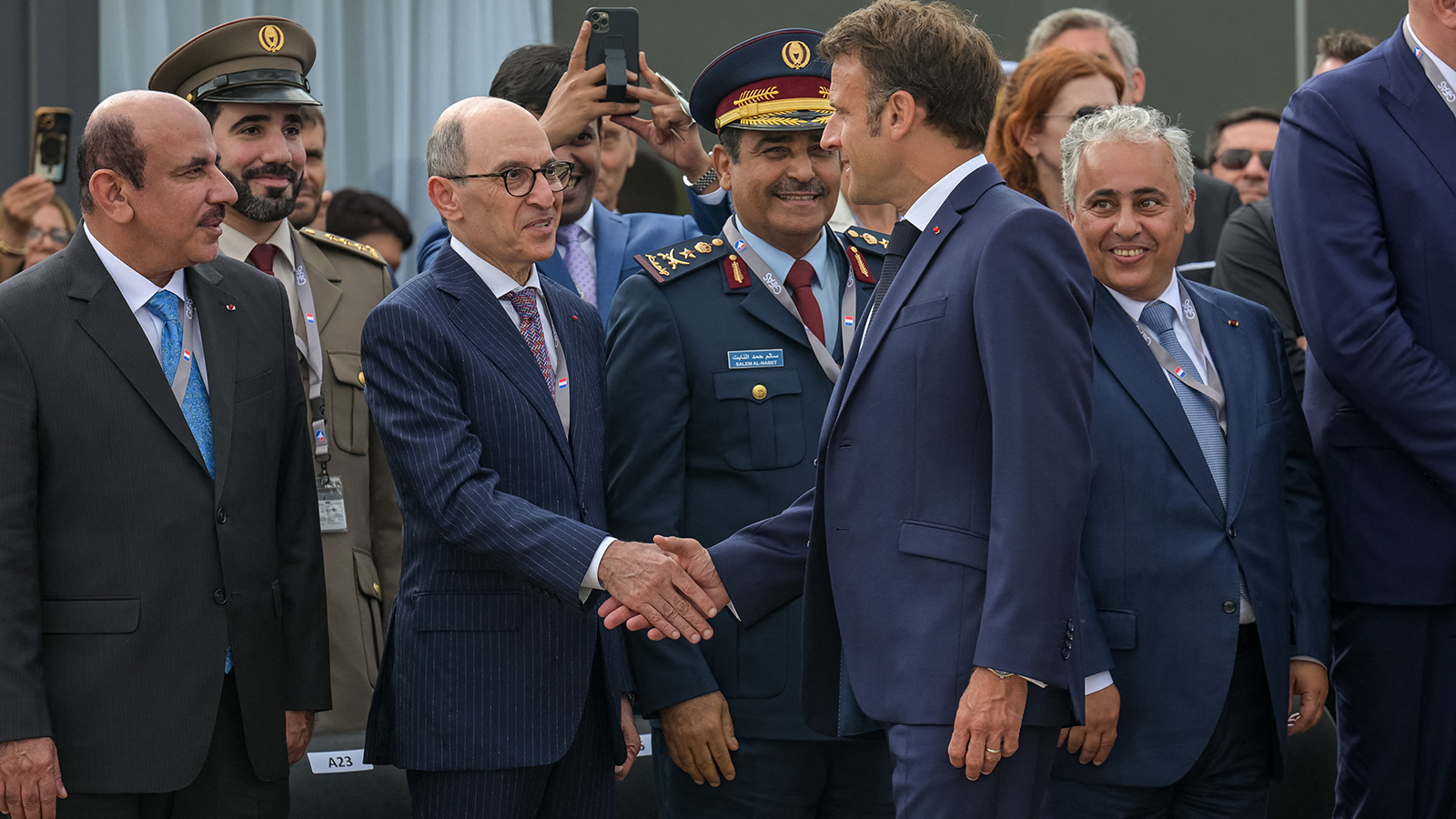 French president Emmanuel Macron (center) meets with Qatar Airways CEO Akbar Al Baker as he inaugurates 54th Salon de l&rsquo;Air et de l&rsquo;space or 'Paris Air Show' at Le Bourget airport near Paris, France, on June 19, 2023.