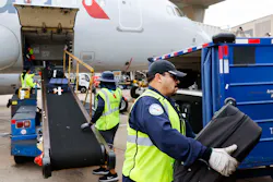 Members of the ground crew unload baggage from an American Airlines flight from Grand Rapids, MI on Tuesday, May 9, 2023 at DFW Airport. Members of the ground crew unload baggage from an American Airlines flight from Grand Rapids, MI on Tuesday, May 9, 2023 at DFW Airport.