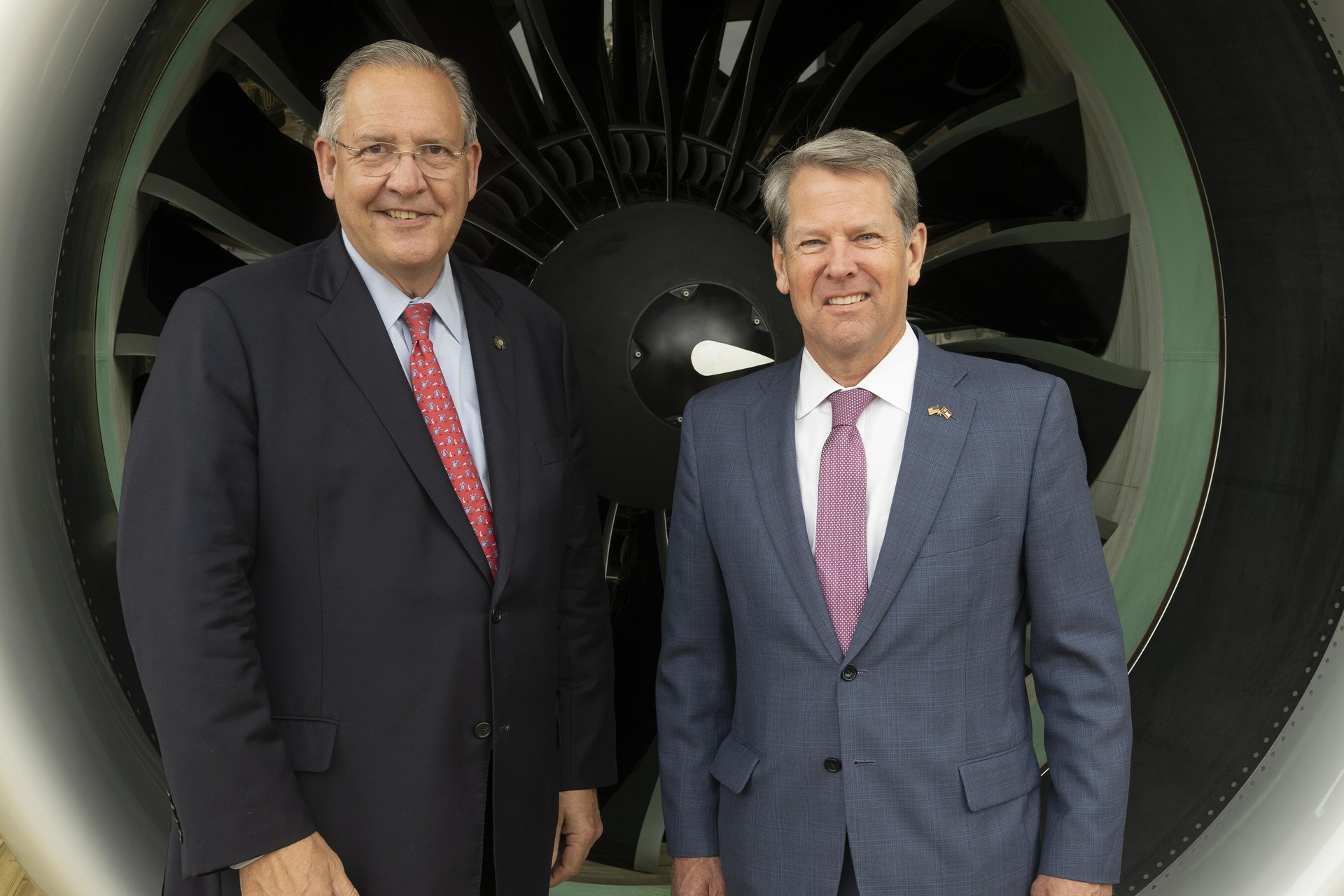 Pratt & Whitney announced a $206 million investment plan to expand the capabilities and footprint of its Columbus, Georgia, business, which supports commercial and military engine programs. Pictured (L to R): RTX CEO Greg Hayes and Georgia Gov. Brian Kemp.