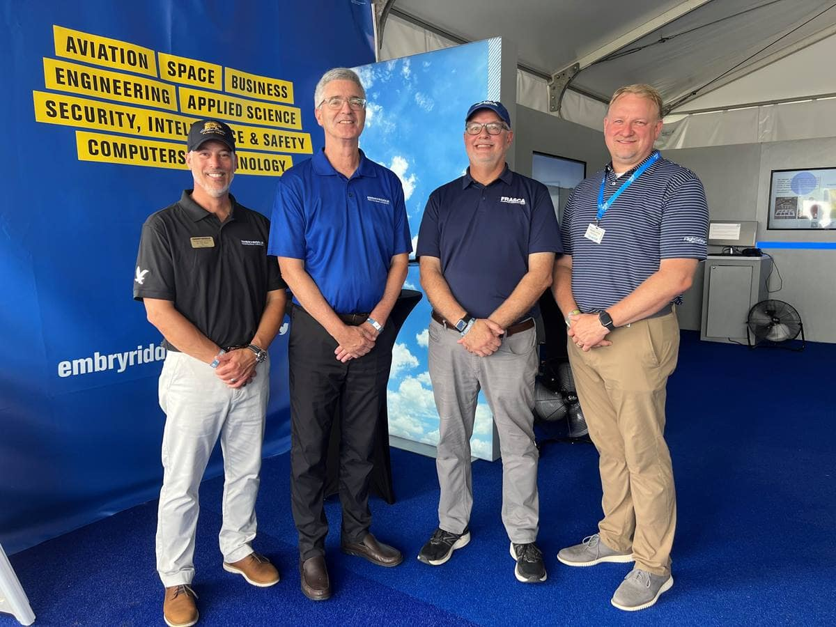 Embry-Riddle College of Aviation Dean Tim Holt and President P. Barry Butler, Ph.D., attended a ceremony at EAA AirVenture Oshkosh this week, with Frasca International President John Frasca and Richard Lofton, director of commercial sales operations for FlightSafety International, to celebrate a new $5 million agreement to bring new flight-training equipment to the Prescott Campus.
