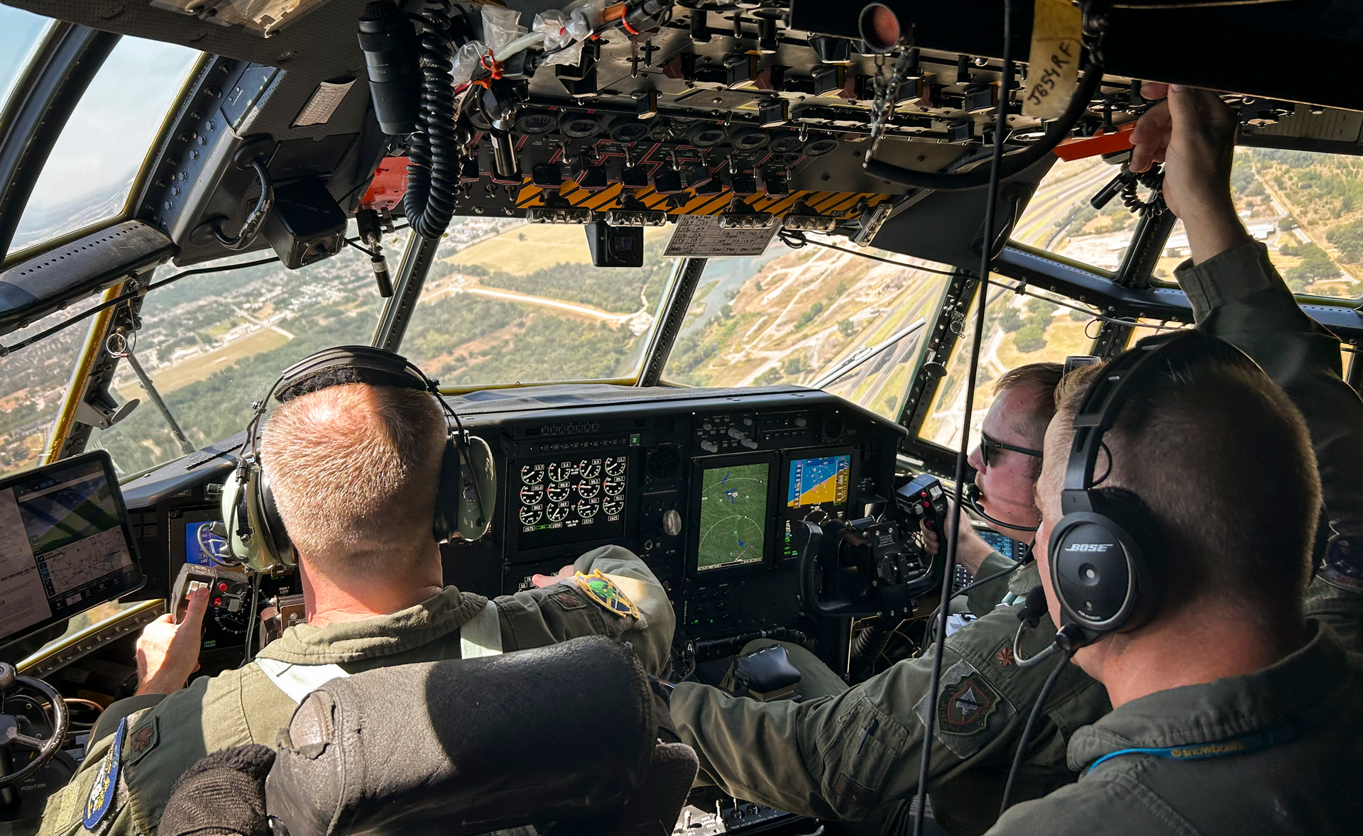 Aircrew test out a C-130H Hercules new digital displays for the first time Aug. 2, 2023, on a flight to Eglin Air Force Base, Fla. The major upgrade, called Avionics Modernization Program Increment 2, is a significant improvement to the almost 60-year-old aircraft&rsquo;s avionics and navigation systems.