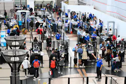 Airline passengers wait at a Transportation Security Administration (TSA) checkpoint to clear security before boarding to flights in the airport terminal in Denver on April 19, 2022. Airline passengers wait at a Transportation Security Administration (TSA) checkpoint to clear security before boarding to flights in the airport terminal in Denver on April 19, 2022.