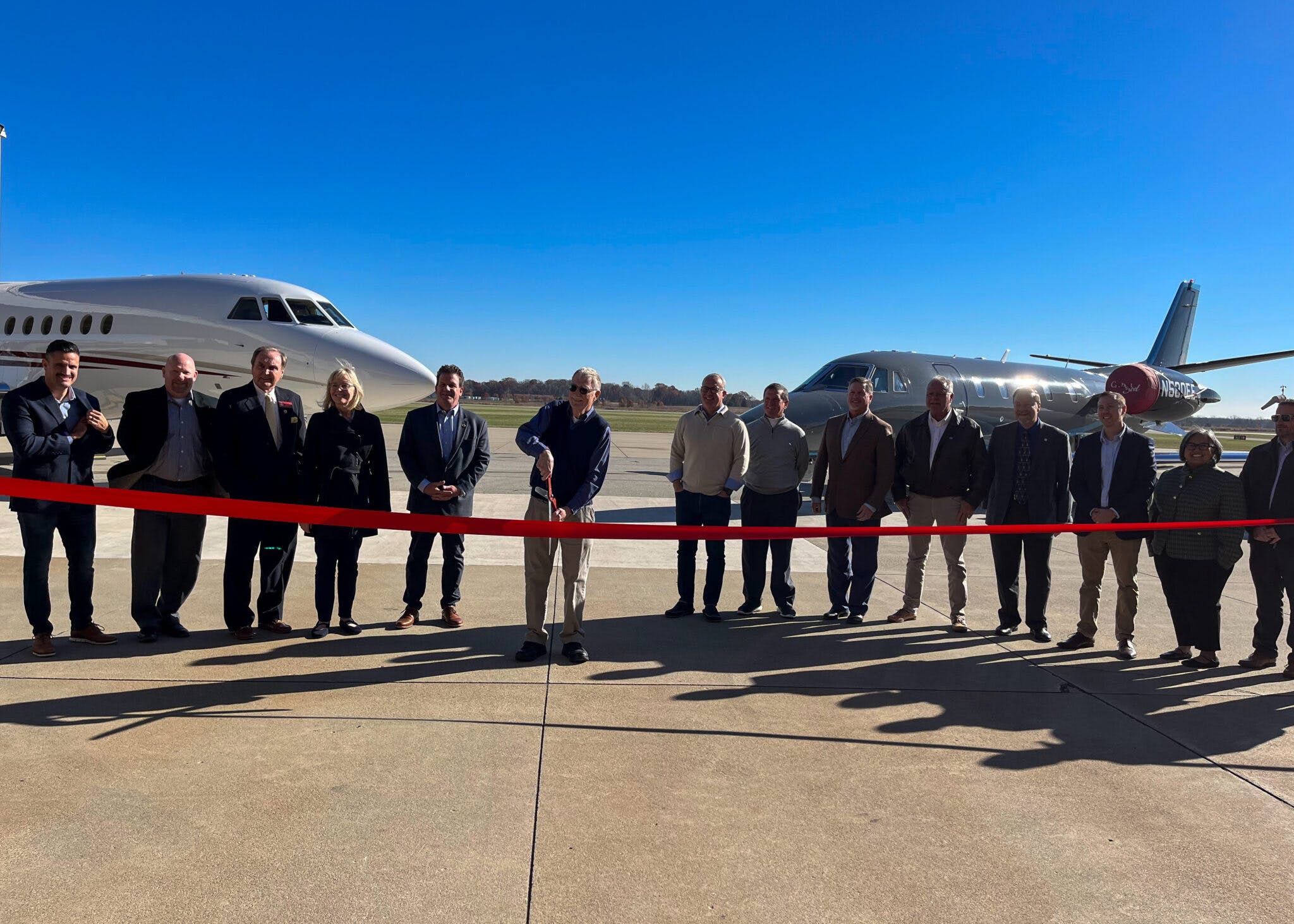 Ribbon cutting to celebrate the completed runway extension project at Indianapolis Executive Airport.