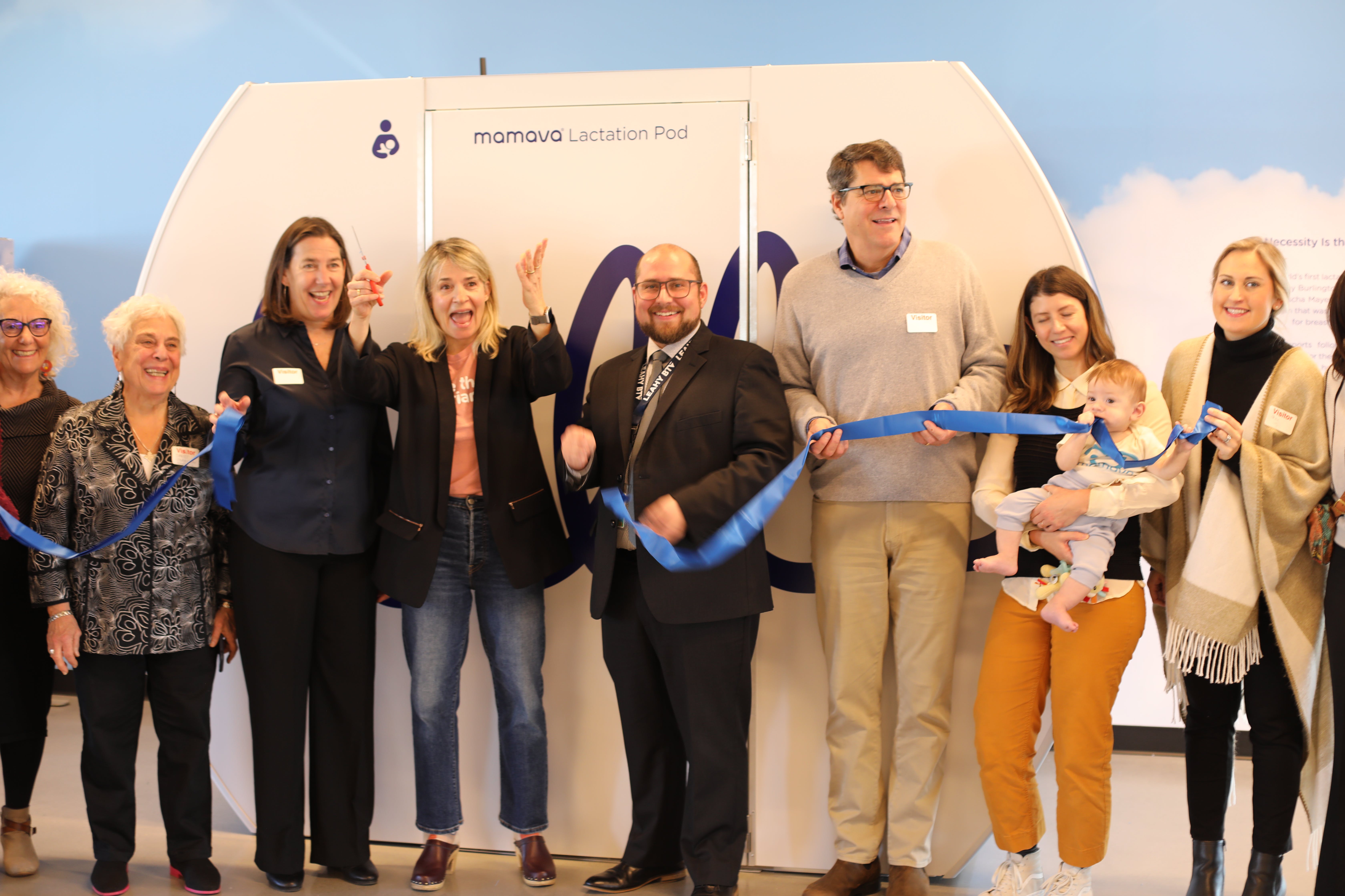 Mamava cofounders Christine Dodson and Sascha Mayer, along with Airport Director Nic Longo and Mamava staff, cut the ribbon on Mamava's new XL V6 pod. The Patrick Leahy Burlington International Airport will serve as the pilot location for the pod.