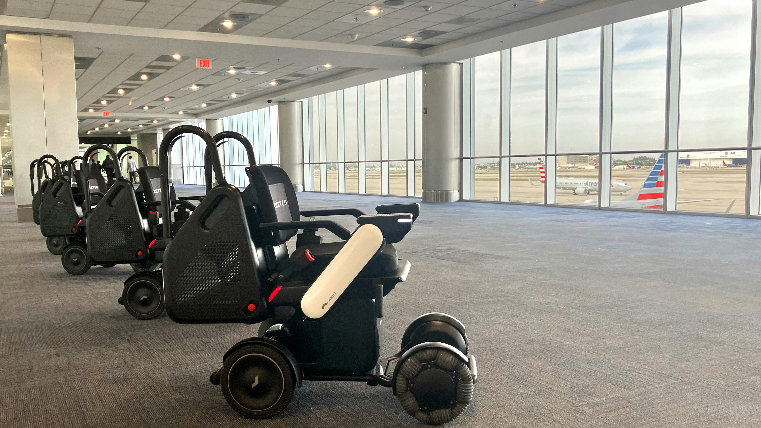 row_of_whill_autonomous_at_mia