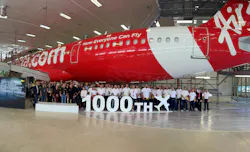 MAAS Aviation and Airbus teams celebrate delivery of the 1000th aircraft livery painted at the MAAS Hamburg paint shops, May 2024. MAAS Aviation and Airbus teams celebrate delivery of the 1000th aircraft livery painted at the MAAS Hamburg paint shops, May 2024.