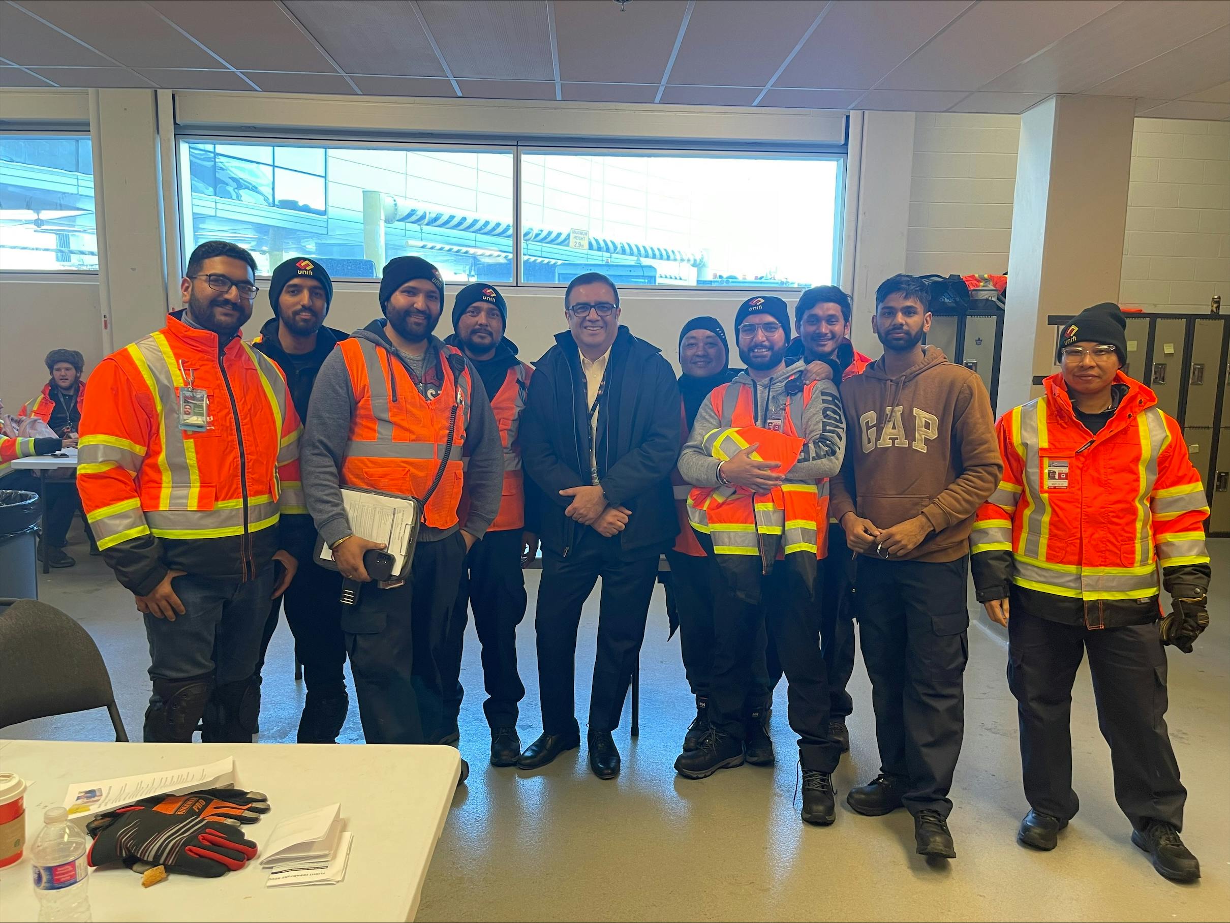 Calgary team members with Unifi CEO Gautam Thakkar.