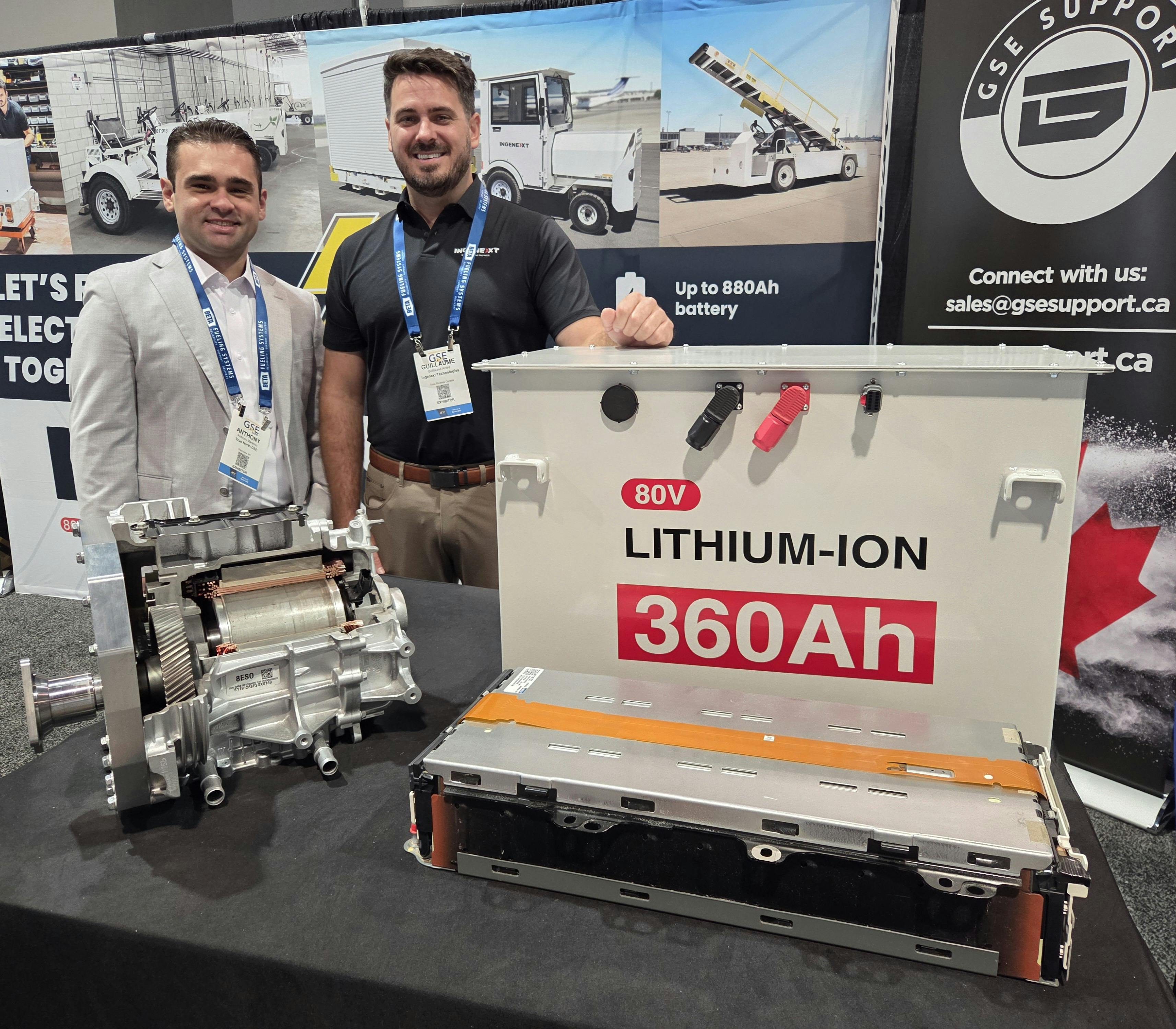 Anthony Marafino, president of True North GSE, left, and Guillaume Andre, co-founder and COO of Ingenext, at their booth during the International GSE Expo in Las Vegas, showcasing salvaged EV motor components repurposed to electrify ground support equipment.