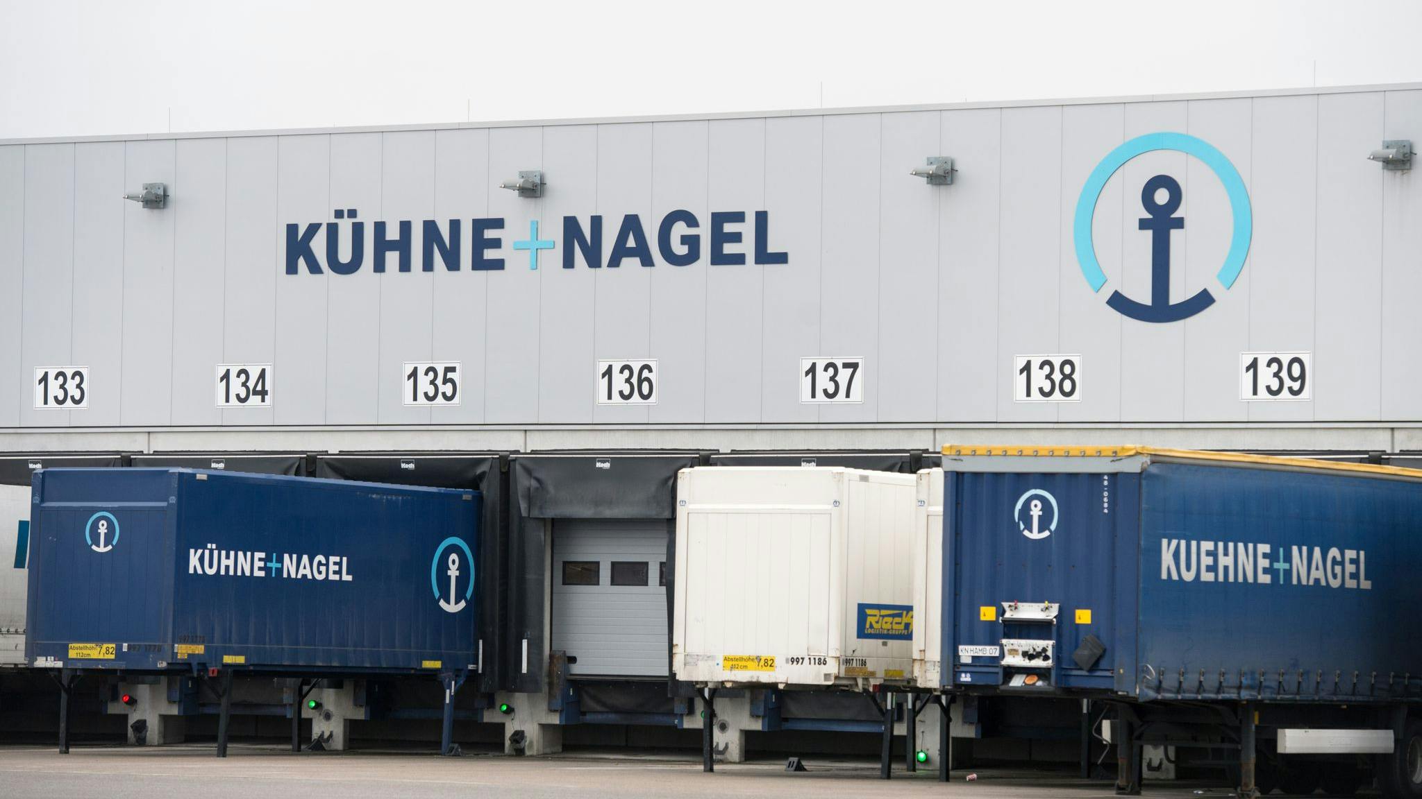 Trucks by the company Kuehne+Nagel stand at the industrial area Obergeorgswerder in Hamburg. (Daniel Reinhardt/dpa/TNS)