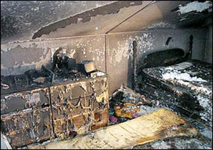 Intense heat and fire caused heavy damage to a second-floor bedroom where the fire started.