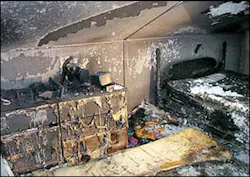 Intense heat and fire caused heavy damage to a second-floor bedroom where the fire started. Intense heat and fire caused heavy damage to a second-floor bedroom where the fire started.