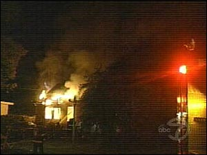 The house in flames in July.