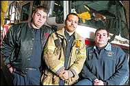 Three New Brunswick firefighters, from left, Capt. Dean Wournell, Victor Ortega and Fred Schatzman, are credited with saving an 11-year-old boy from a burning Somerset Street home yesterday.