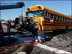 Investigators are still reviewing yesterday's crash between a Stafford County school bus and a Hartwood firetruck.