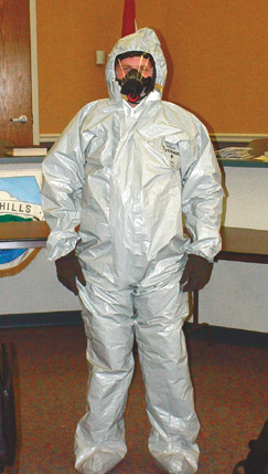 Submitted photo Corporal Chad Rasnic of the Park Hills Police Department demonstrates the new protective gear being provided officers through a Homeland Security grant. The gear protects officers against chemical and biological contamination.