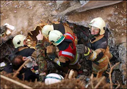 Members of rescue teams try to reach six fire-fighters, who are still trapped in the debris, after the ceiling of an underground car park collapsed during a fire, Saturday, Nov 27, 2004, in Gretzenbach, northern Switzerland Members of rescue teams try to reach six fire-fighters, who are still trapped in the debris, after the ceiling of an underground car park collapsed during a fire, Saturday, Nov 27, 2004, in Gretzenbach, northern Switzerland