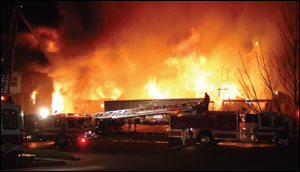 Sixty firefighters and 25 pieces of apparatus from five fire departments responded to the early-morning fire.