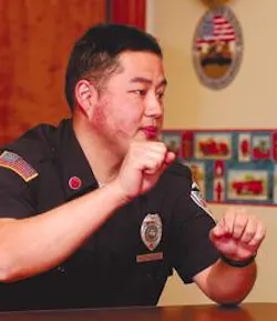 Sugar Creek volunteer firefighter Hidekatsu Kajitani describes the effort it took to climb 475 feet to rescue Alan Cook from the broadcast tower. Sugar Creek volunteer firefighter Hidekatsu Kajitani describes the effort it took to climb 475 feet to rescue Alan Cook from the broadcast tower.