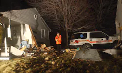 Brighton Township firefighter Dale Carter surveys the scene at 90 Walnut St. on Monday. Brighton Township firefighter Dale Carter surveys the scene at 90 Walnut St. on Monday.