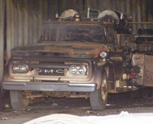 A scorched truck remains inside the fire hall.