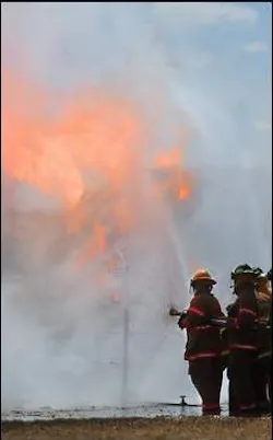 Firefighters get experience in the right way to extinguish a fire involving propane gas. Firefighters get experience in the right way to extinguish a fire involving propane gas.