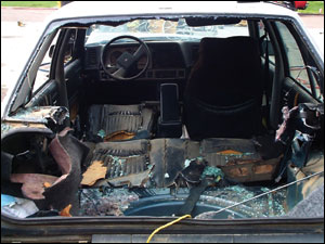 The end result of trunk tunneling creates a pathway sufficient to access and then extricate the driver. In this training scenario, crews can work only from the rear to accomplish this task and cannot access the sides of the vehicle forward of the rear wheels.