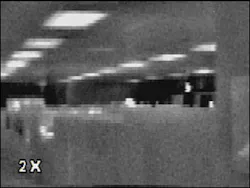 Photos 2A and 2B: A thermal image of a hallway in standard mode with 2X digital zoom activated. While details are brought closer, the image becomes pixilated in the process. Photos 2A and 2B: A thermal image of a hallway in standard mode with 2X digital zoom activated. While details are brought closer, the image becomes pixilated in the process.