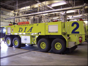 Denver International Airport crews not only must respond to all airport incidents, but to those occurring on the miles of roadways and highways extending several miles away from the airport. Here sits one of the airport's E-ONE Titan HPR 8x8s, used for aircraft rescue and firefighting.