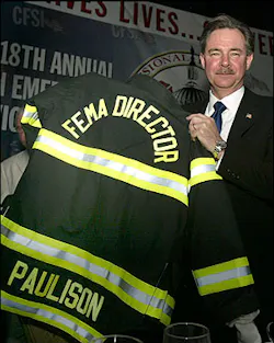 R. David Paulison with new turnout coat at the annual CFSI dinner. R. David Paulison with new turnout coat at the annual CFSI dinner.