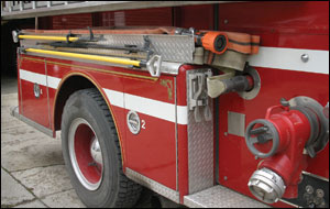 Take a little time to step back and evaluate your operation. This pumper was upgraded by mounting a two-inch, 250-gpm, low-pressure attack line within easy reach and then mounting new truck tools in spots that are easy to access. These hooks replaced old, splintered wood-handle pike poles that were mounted over the hosebed.
