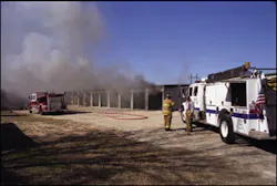 Smoke pushing out of numerous storage units indicates that the fire has extended beyond its point of origin. Smoke pushing out of numerous storage units indicates that the fire has extended beyond its point of origin.
