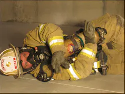 The firefighter lies on their left side tucking the S.C.B.A. into their body as much as possible and proceeds through the entanglement with their arms crossed over protecting the S.C.B.A. One arm can be used to 'swim' hazards up and out of the way. The firefighter lies on their left side tucking the S.C.B.A. into their body as much as possible and proceeds through the entanglement with their arms crossed over protecting the S.C.B.A. One arm can be used to 'swim' hazards up and out of the way.
