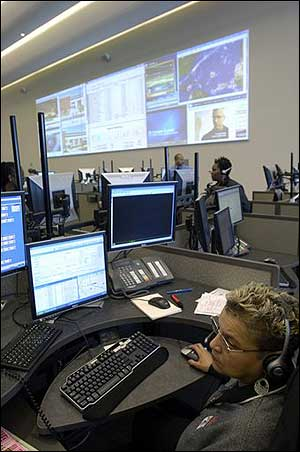 Velda Norristakes takes calls at the Unified Communications Center, Sept. 26 in Washington, D.C.