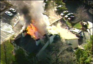 A cigarette discarded in a flowerpot started the fire.