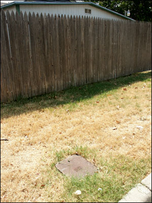 The shut off is not always located within the fence line for a residence.