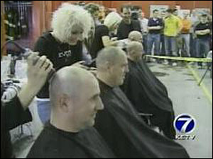 Jones' fellow firefighters shaved their heads and raised $5,000 for the family's expenses.