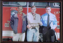 Michael French, far right, is congratulated by his uncle, Marvin Campbell, center, and Michael Campbell, his cousin. Michael French, far right, is congratulated by his uncle, Marvin Campbell, center, and Michael Campbell, his cousin.