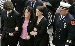 Adam Cahill, left, his mother Anne and her daughter Shawna, right, enter Holy Name Catholic Church in Boston, Sept. 6. Adam Cahill, left, his mother Anne and her daughter Shawna, right, enter Holy Name Catholic Church in Boston, Sept. 6.