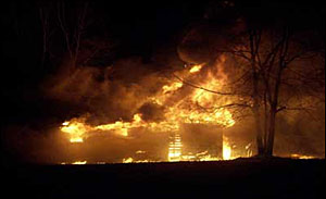 NIOSH F-2005-09: This photo was taken just prior to, or near the time of the roof collapse.