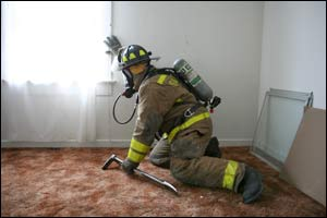 Doors and windows are survival landmarks that are important to every firefighter operating inside structures. It is important that firefighters sweep high enough on the wall to locate the door handle or window sill and make a mental note of its location.