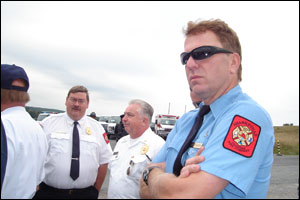 Shanksville Chief Terry Shaffer, left, talks with Central City Chief William Russian, while Brad Zearfoss watches the ceremonies.