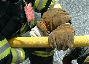 The Seattle Grip, described by Dave Fornell in his textbook Fire Stream Management, allows for much greater control of a 1 3/4-inch line. The backup firefighter takes the following positioning with his arms and then clamps down on the line and pushes forward. It is a very effective means of controlling nozzle reaction and cuts down on fatigue.