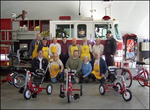 Lady's Island St. Helena Firefighters forge a working relationship with their local chapter of Kiwanis International and The Little Red Dog Foundation to purchase, build, and present special bicycles to special needs children in the Low country of South Carolina. Every time we get together we share a message of safety, be it fire safety, bike safety, auto safety or the like.