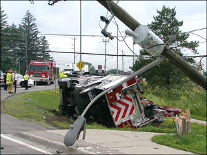 A fire truck rolled over after it tried to avoid slamming into traffic on route to a call on June 30.