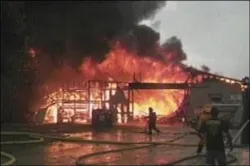 Firefighters said a lightning strike sparked a fire that destroyed a cabinet factory in St. Marys, Ga. Firefighters said a lightning strike sparked a fire that destroyed a cabinet factory in St. Marys, Ga.