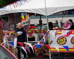 An under-age teen returns with a solo purchase of fireworks from a Hillsboro fireworks stand. An under-age teen returns with a solo purchase of fireworks from a Hillsboro fireworks stand.