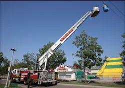 Crews use Ladder 8's aerial ladder and bucket to access a simulated 'stranded cabin' along the Skyride route. Crews use Ladder 8's aerial ladder and bucket to access a simulated 'stranded cabin' along the Skyride route.