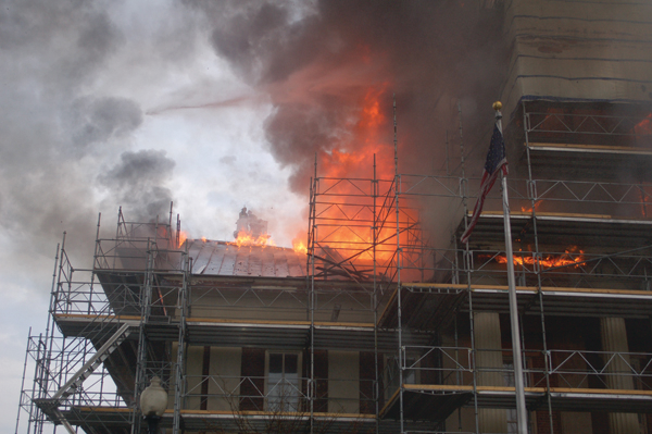 Photo taken about one hour into the fire shows the north side of the courthouse with heavy fire venting from the roof.