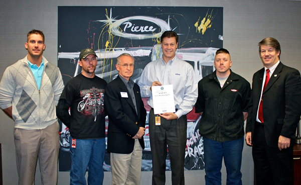 (Left to right) Aaron Ferge and Ken Behrent, Wisconsin National Guard and Reserve members and Pierce employees; LeRoy Frahm, Ombudsman, Wisconsin Committee for ESGR; Jim Johnson, President, Pierce Manufacturing; Bryan Waters, Wisconsin National Guard and Reserve members and Pierce employee; and Jeff Unger, Transition Assistance Advisor for State of Wisconsin, Dept. of Military Affairs.