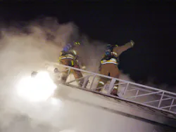 Firefighters on an aerial ladder vent the church roof as steam (not smoke) from TetraKO's defensive fire attack escapes. The church building, and much of its contents are saved, with minimal water damage Firefighters on an aerial ladder vent the church roof as steam (not smoke) from TetraKO's defensive fire attack escapes. The church building, and much of its contents are saved, with minimal water damage